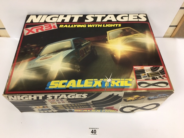 A VINTAGE SCALEXTRIC NIGHT STAGES XR3I RALLYING SET WITH LIGHTS, IN ORIGINAL BOX
