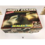 A VINTAGE SCALEXTRIC NIGHT STAGES XR3I RALLYING SET WITH LIGHTS, IN ORIGINAL BOX