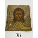 A RELIGIOUS ICON WALL PLAQUE DEPICTING JESUS, 19CM BY 16.5CM