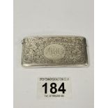 AN EDWARDIAN SILVER CARD CASE OF RECTANGULAR FORM WITH ENGRAVED FOLIATE DECORATION TO THE FRONT