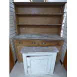 A LATE VICTORIAN STRIPPED PINE DRESSER WITH A SMALL VICTORIAN PAINTED PINE WALL CABINET