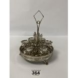 A VINTAGE SILVER PLATED SIX PIECE EGG CUP AND SPOON SET MOUNTED UPON FITTED TRAY OF CIRCULAR FORM,