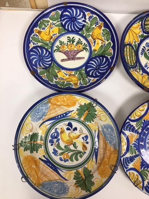 SIX LATE 19TH/EARLY 20TH CENTURY CONTINENTAL TIN GLAZED CHARGERS OF CIRCULAR FORM, EACH DECORATED - Image 2 of 5