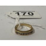 A 9CT YELLOW GOLD HALF ETERNITY RING SET WITH NINE DIAMONDS, RING SIZE J/K, 2.82G
