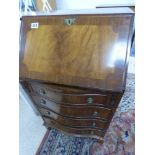 A SMALL SERPENTINE FRONT MAHOGANY BUREAU 53 X 41 X 94 WITH LOCKABLE KEY