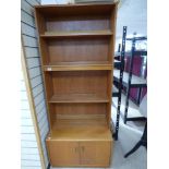A MID CENTURY TEAK DISPLAY UNIT BY E GOMME LTD AND SUPPLIED BY MAPLE AND CO, 198CM BY 46CM BY 82CM