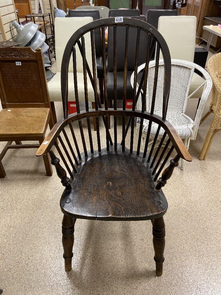 A LARGE EARLY ELM WINDSOR STICK BACK CHAIR