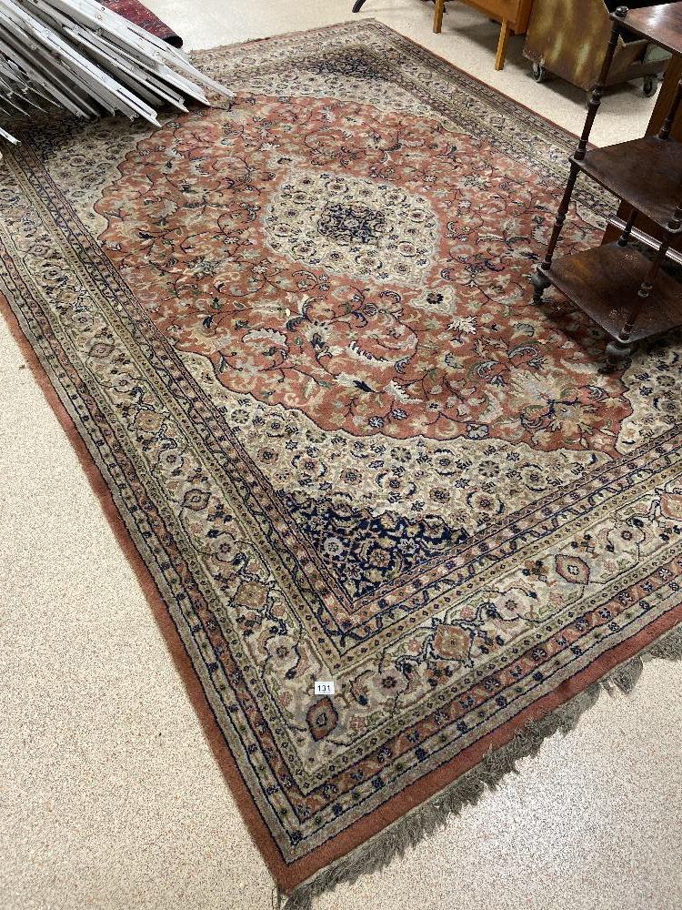 A LARGE PERSIAN MIDDLE EASTERN RUG, 327CM BY 234CM