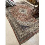 A LARGE PERSIAN MIDDLE EASTERN RUG, 327CM BY 234CM