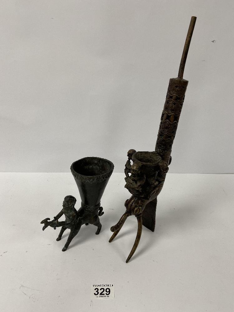 AN UNUSUAL BRONZE OPIUM PIPE IN THE FORM OF A STYLIZED BUG, TOGETHER WITH A SIMILARLY UNUSUAL BRONZE