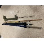 FOUR VINTAGE FISHING RODS IN CASES, INCLUDING A SHAKESPEARE DAPPER 1302-520