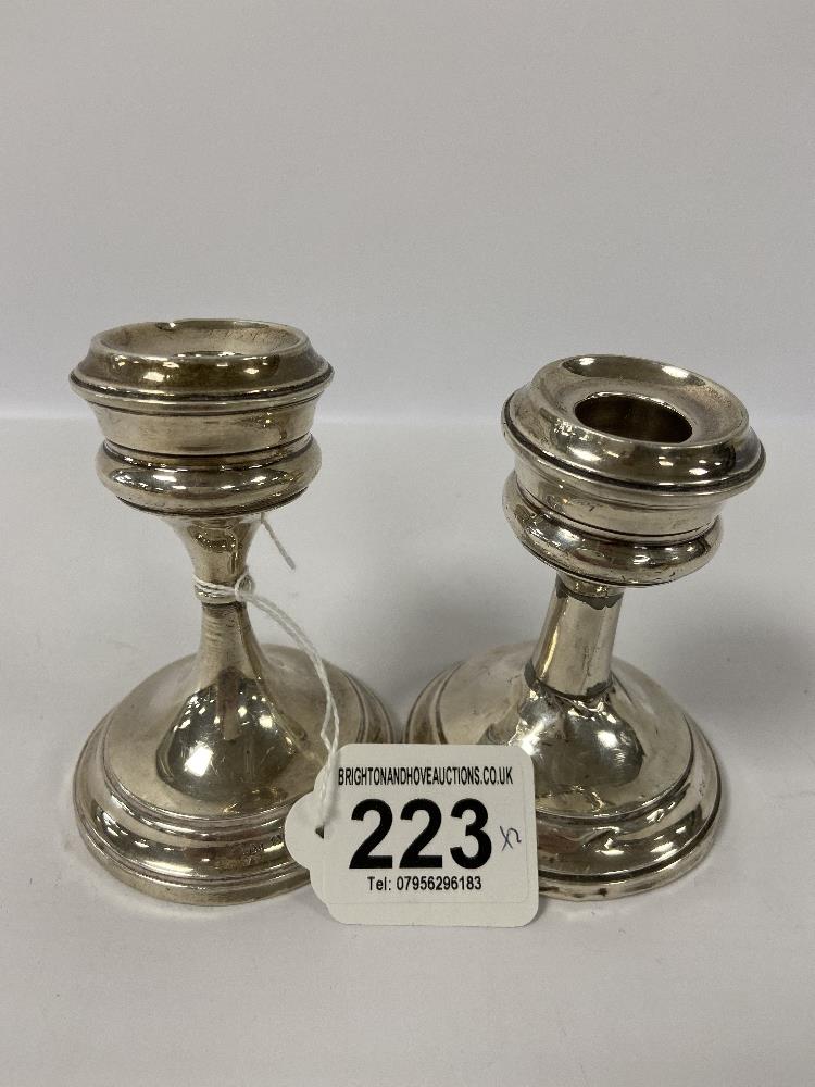 A PAIR OF EDWARDIAN SILVER SQUAT CANDLESTICKS, HALLMARKED BIRMINGHAM 1902 BY JONES & CROMPTON,