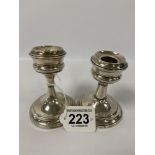 A PAIR OF EDWARDIAN SILVER SQUAT CANDLESTICKS, HALLMARKED BIRMINGHAM 1902 BY JONES & CROMPTON,