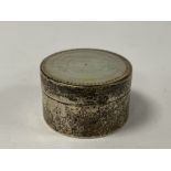 A LATE VICTORIAN SILVER PILL BOX OF CIRCULAR FORM WITH MOTHER OF PEARL DISK SET TO THE LID AND BASE,