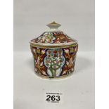 A 19TH CENTURY OR EARLIER PORCELAIN LIDDED POT OF OVAL FORM, POSSIBLY A TEA CADDY, 13CM WIDE BY 14.