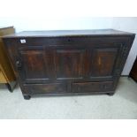 A 17TH CENTURY OAK CUPBOARD WITH THREE INSET PANELLED FRONT, ORNATE HINGES AND TWO BOTTOM DRAWERS,