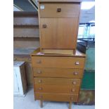TWO MID CENTURY TEAK PIECES COMPRISING A FIVE DRAWER CHEST AND A BEDSIDE CHEST BY SYMBOL FURNITURE