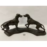 A HEAVY CAST IRON FIGURE GROUP OF TWO DOGS, 48CM WIDE