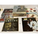 A QUANTITY OF VINTAGE VINYL RECORDS/ALBUMS, INCLUDING CLIFF RICHARD, ROLF HARRIS AND SIMON &