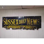 A LARGE ENAMEL SIGN 'SUSSEX DAILY NEWS', 200CM BY 67CM