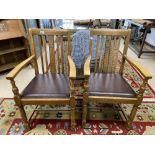 PAIR OF ARTS AND CRAFTS OAK ARMCHAIRS BY PIONEER OF LIVERPOOL