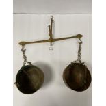A SET OF BRASS BALANCE SCALES WITH COPPER BOWLS
