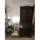 FOUR PIECES OF MIXED FURNITURE INCLUDING A FLAME MAHOGANY DISLAY UNIT