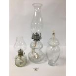 THREE VINTAGE CLEAR GLASS OIL LAMPS, LARGEST 39.5CM HIGH