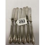A SET OF SIX SILVER HANDLED BUTTER KNIVES, HALLMARKED SHEFFIELD 1915 BY ALFRED BIGGIN & SON