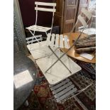 TWO PAIRS OF WHITE METAL FOLDING TABLES AND CHAIRS