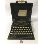 A VINTAGE REMINGTON TYPEWRITER IN ORIGINAL CASE, REF NO V136767