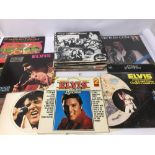 LARGE COLLECTION OF VINTAGE VINYL ALBUMS INCLUDING ELVIS, THE BEATLES AND MORE