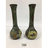 A PAIR OF ORIENTAL CLOISONNE ENAMEL VASES WITH FLORAL AND BUTTERFLY DECORATION, 22CM HIGH (AF)