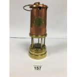 A HOCKLEY LAMP AND LIMELIGHT BRASS PARAFFIN MINERS LAMP, 22.5CM HIGH