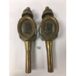 A PAIR OF VINTAGE BRASS AND BRASS COACHING LAMPS, 45CM LONG