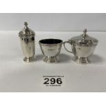 A SILVER THREE PIECE CONDIMENT SET WITH CAST BORDERS, HALLMARKED LONDON 1972 BY A CHICK & SONS