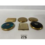 A GROUP OF SIX LADIES COMPACTS OF CIRCULAR AND RECTANGULAR FORM, MOST BEING BY KIGU, LARGEST 8.5CM