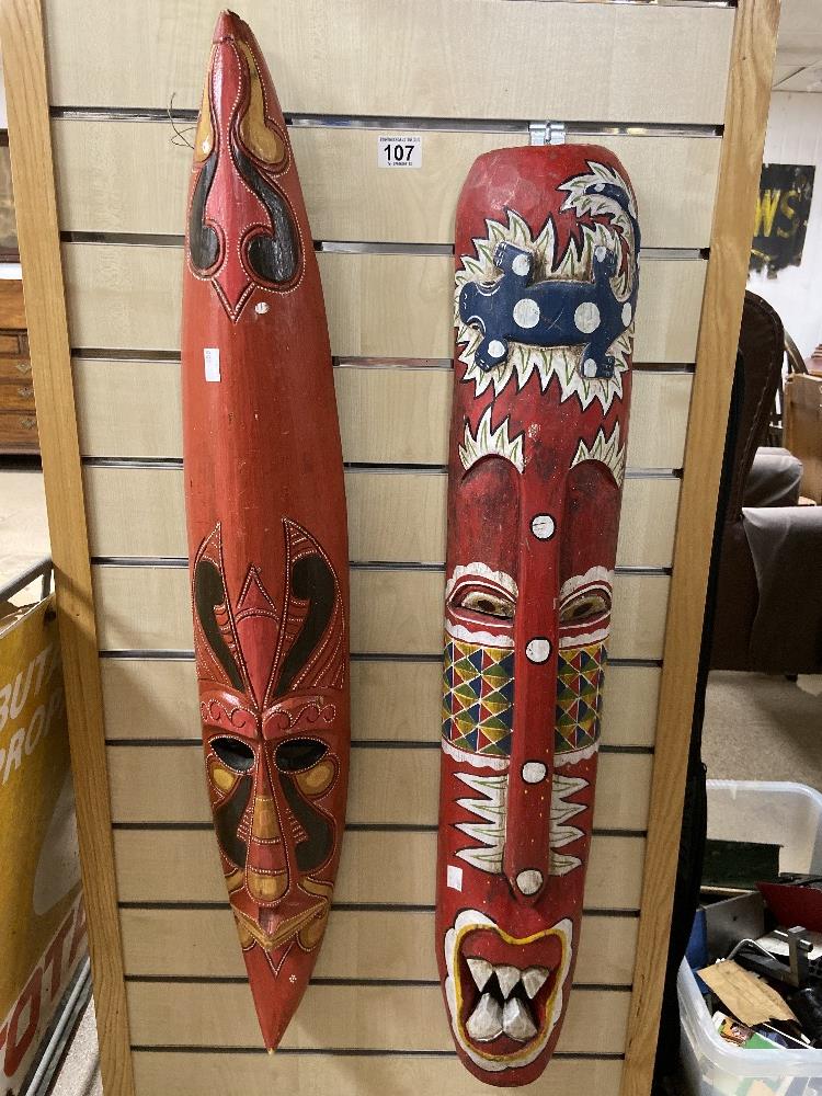 TWO LARGE TRIBAL ART MASK RED PAINTED WALL HANGINGS