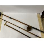 A VINTAGE BAMBOO FISHING ROD WITH FLY FISHING REEL, IN TWO PIECES, TOGETHER WITH A DOG SHAPED