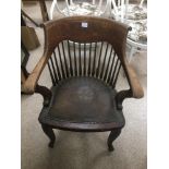 A VICTORIAN OAK OFFICE CHAIR WITH PADDED LEATHER SEAT