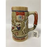 A 1984 LOS ANGELES OLYMPICS BUDWEISER CERAMIC BEER TANKARD, 16CM HIGH