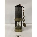 A VINTAGE BRASS AND METAL MINERS LAMP, STAMPED MARK THROUGHOUT 630, 25.5CM HIGH, TOGETHER WITH A