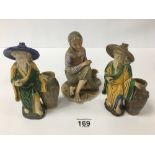A PAIR OF ORIENTAL CERAMIC FIGURES OF ELDERLY MEN, 16.5CM HIGH, TOGETHER WITH ANOTHER CERAMIC