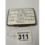 AN UNUSUAL 18TH CENTURY FRENCH ENAMEL ON METAL SNUFF BOX, THE TOP WITH FRENCH WRITING, THE LID