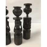 TWO PAIRS OF CARVED AFRICAN WOODEN CANDLESTICKS, LARGEST 23CM HIGH
