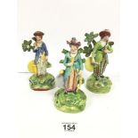 A GROUP OF THREE LATE 18TH/EARLY 19TH CENTURY STAFFORDSHIRE FIGURES OF WOMEN LARGEST 19CM HIGH (AF)