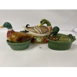 A GROUP OF THREE FRENCH CERAMIC DUCK SHAPED EGG HOLDER DISHES/TUREENS, LARGEST 34CM WIDE