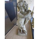 A LARGE RECONSTITUTED STONE FIGURE OF A CHERUB STYLE CHARACTER HOLDING GRAPES, 92CM HIGH