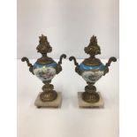 A PAIR OF 19TH CENTURY PORCELAIN AND GILT METAL URN SHAPED GARNITURES, RAISED UPON MARBLE BASE, 13.
