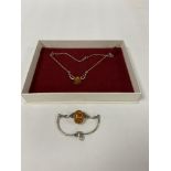 A SILVER AND AMBER NECKLACE AND A MATCHING BANGLE, 16G